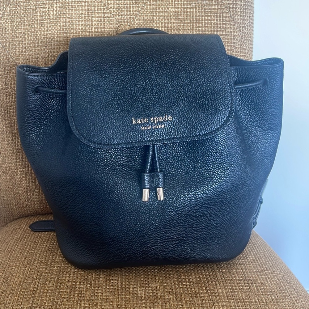 Kate Spade black leather back pack with magnetic closure and drawstring